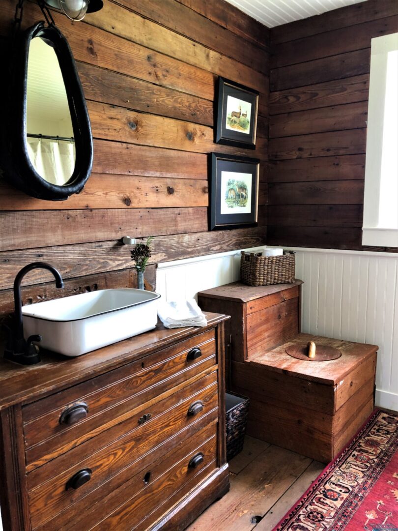 Rustic toilet and washroom at Serenata Farm in Madison, GA